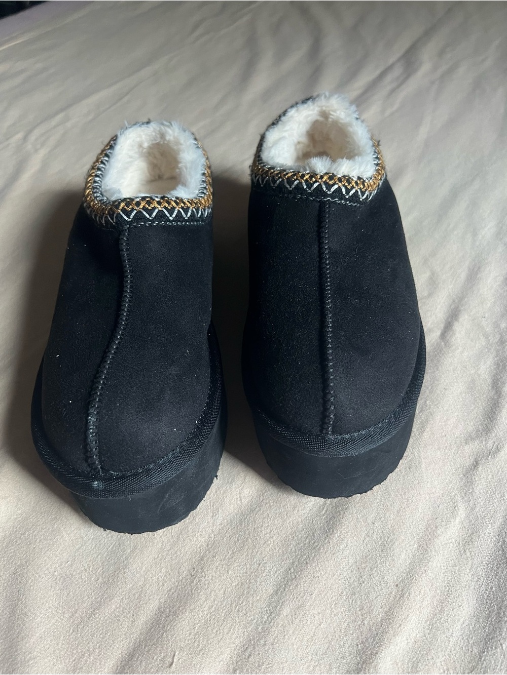 Rock & Candy Black Slip-On Faux Suede Slippers with White Plush Lining
